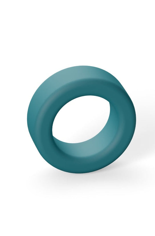 Side view of teal silicone cock ring showing thickness and curved profile