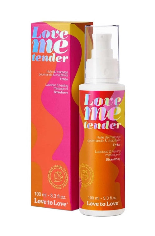 Front view of Love Me Tender massage oil bottle with white pump and orange-pink gradient packaging showing strawberry flavor