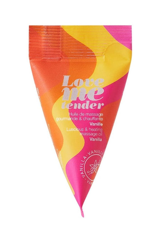 Triangle packet of Love Me Tender massage oil in vanilla scent with orange, yellow, and pink swirl design