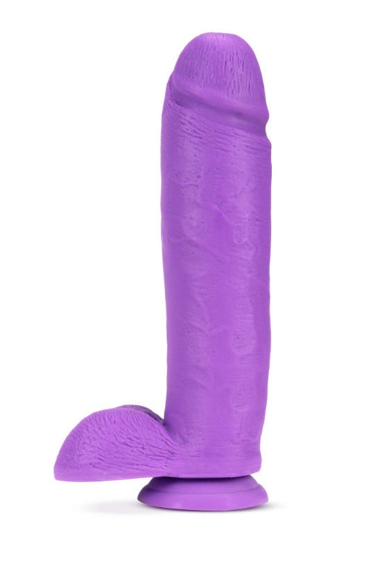 Back view of purple dual density dildo showing curved shaft and flared base