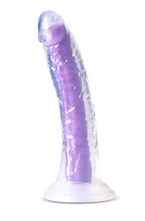 Side view of purple glow-in-the-dark dildo showing realistic texture and curved shape with suction cup base