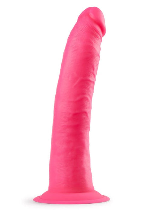 Front view of bright pink silicone dildo with realistic shaft texture and suction cup base