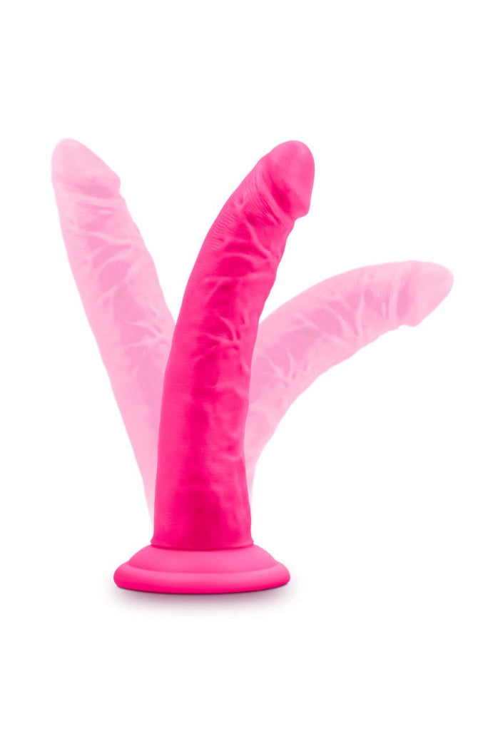 Measurement diagram of pink dildo showing 7.5 inch total length, 7 inch insertable, 1.5 inch diameter
