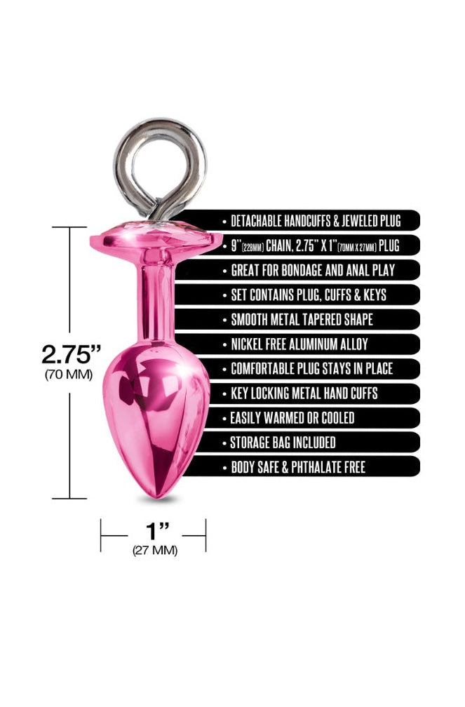 Product specifications diagram showing 2.75-inch pink metal butt plug dimensions