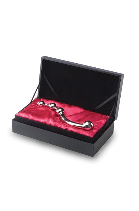 Stainless steel dildo displayed in black gift box with red satin lining