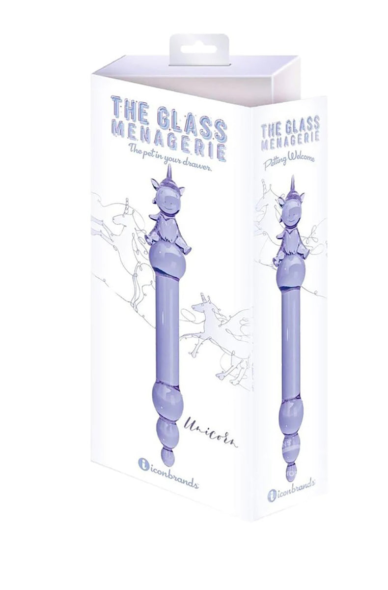 Side view of purple glass unicorn dildo showing the seated unicorn handle, long shaft, and beaded tip.