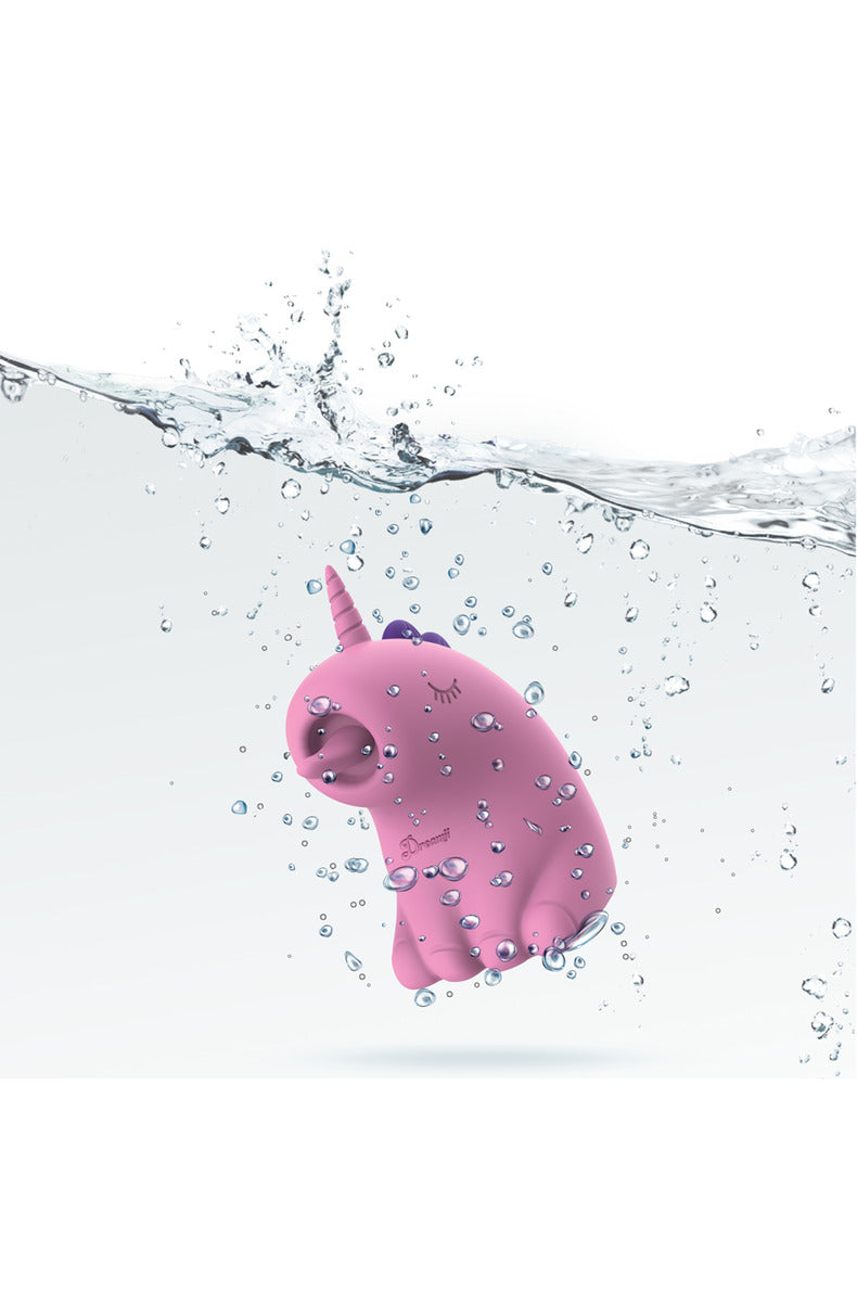 Pink Dreamii Licks unicorn stimulator submerged in water, IPX-7 waterproof