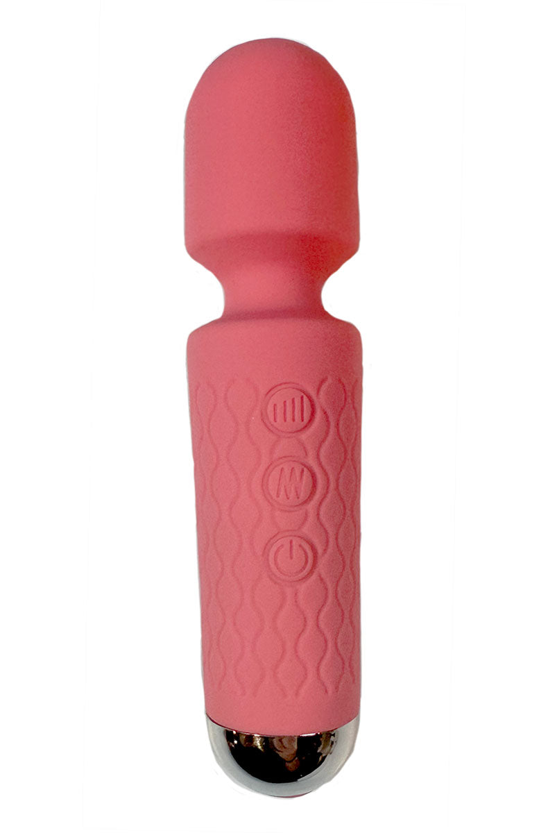 Close-up of pink clitoral suction toy with silicone nozzle and rounded handle.