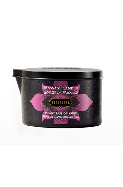 Kama Sutra Massage Oil Candle in Island Passion Fruit with a tropical-print label on a white background.
