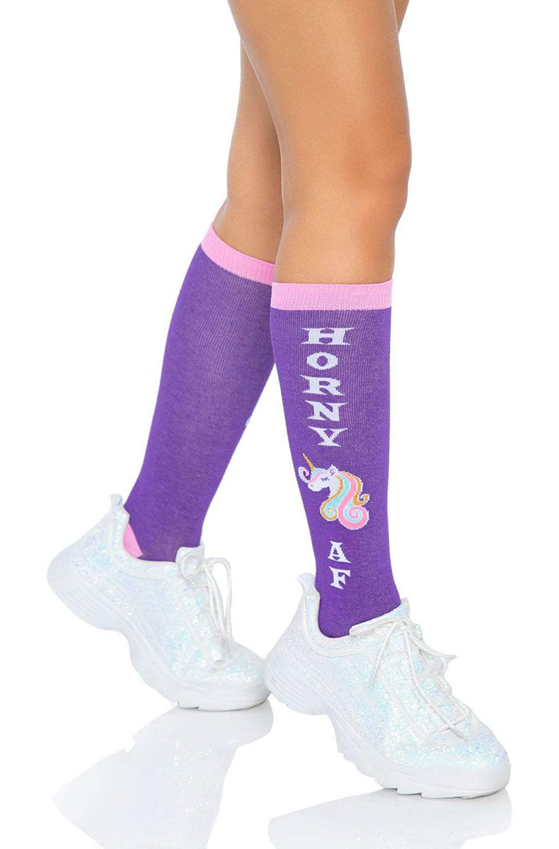 Purple knee-high socks with a pink cuff, a knit pastel unicorn-head graphic, and HORNY above and AF below in white knit lettering.