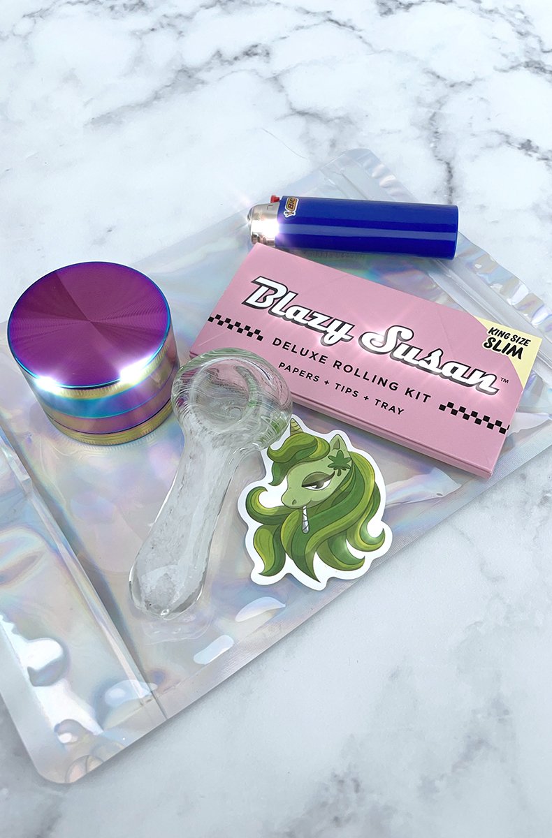 Stoner starter bundle: swirl glass spoon pipe, rainbow grinder, Blazy Susan papers, Bic lighter, weed sticker.