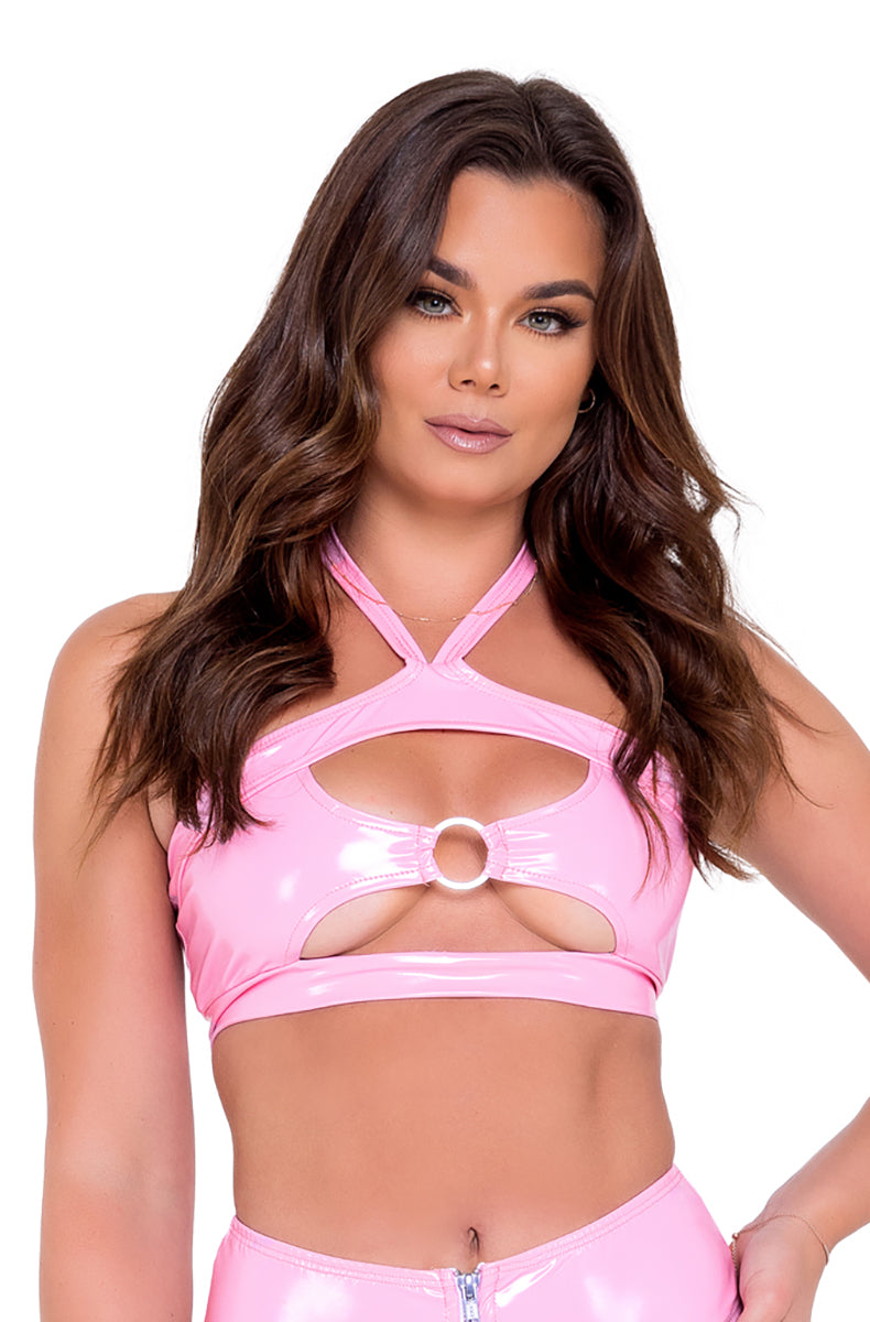 Model wearing glossy baby pink vinyl halter bikini top with O-ring keyhole detail at the bust