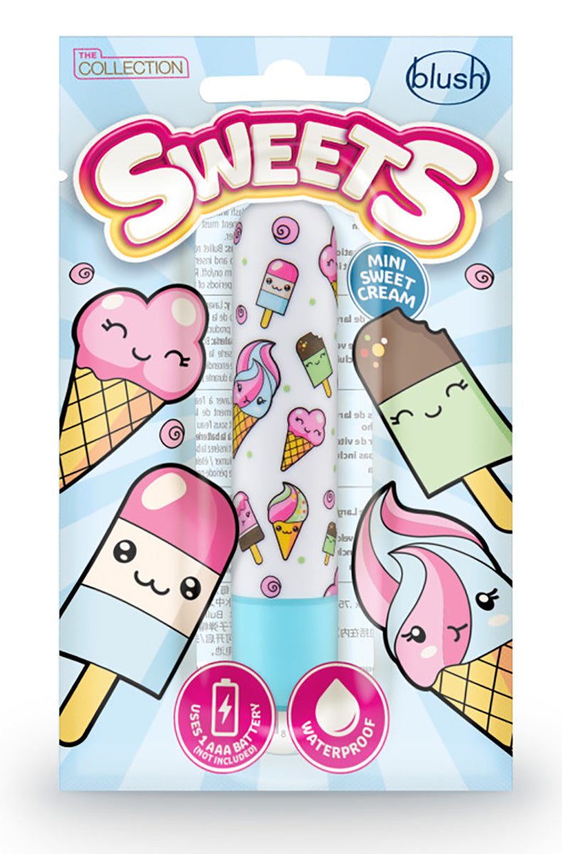 Mini Sweet Cream Bullet vibrator photographed at angle, showing the kawaii dessert print over a light blue push-button base.