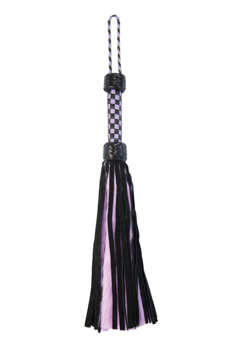 Close-up of lavender faux-fur tails and black suede tails knotted at the braided black collar above the checkered handle.