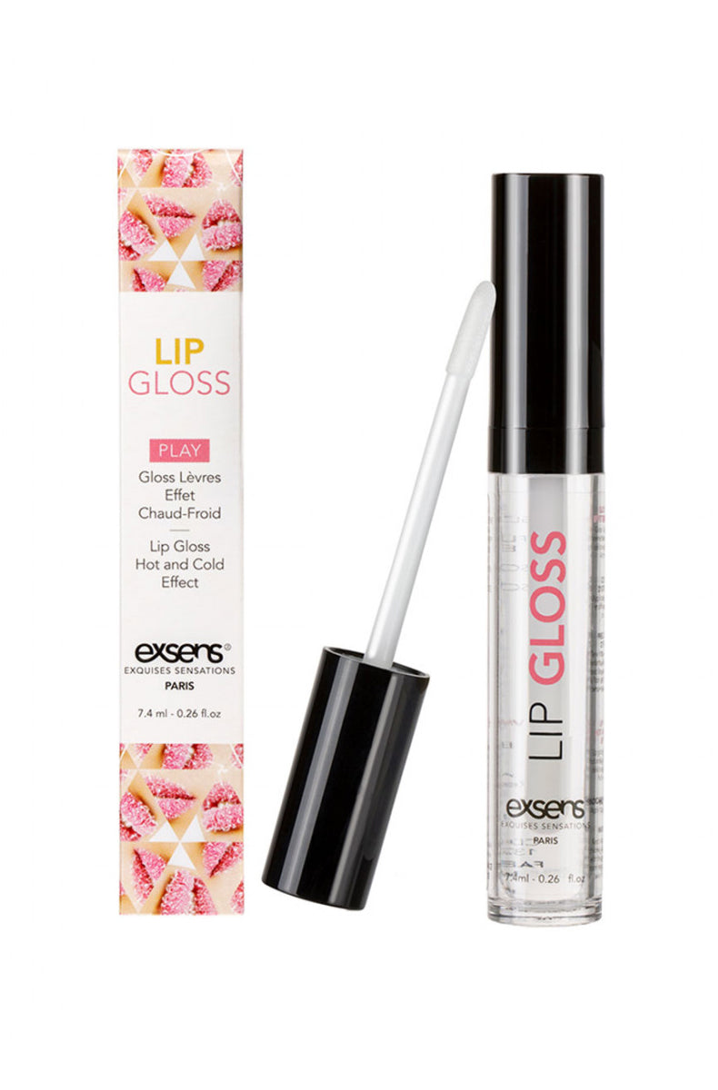 Close-up of Exsens Lip Gloss clear tube laid beside its kiss-print carton labeled 7.4 mL.