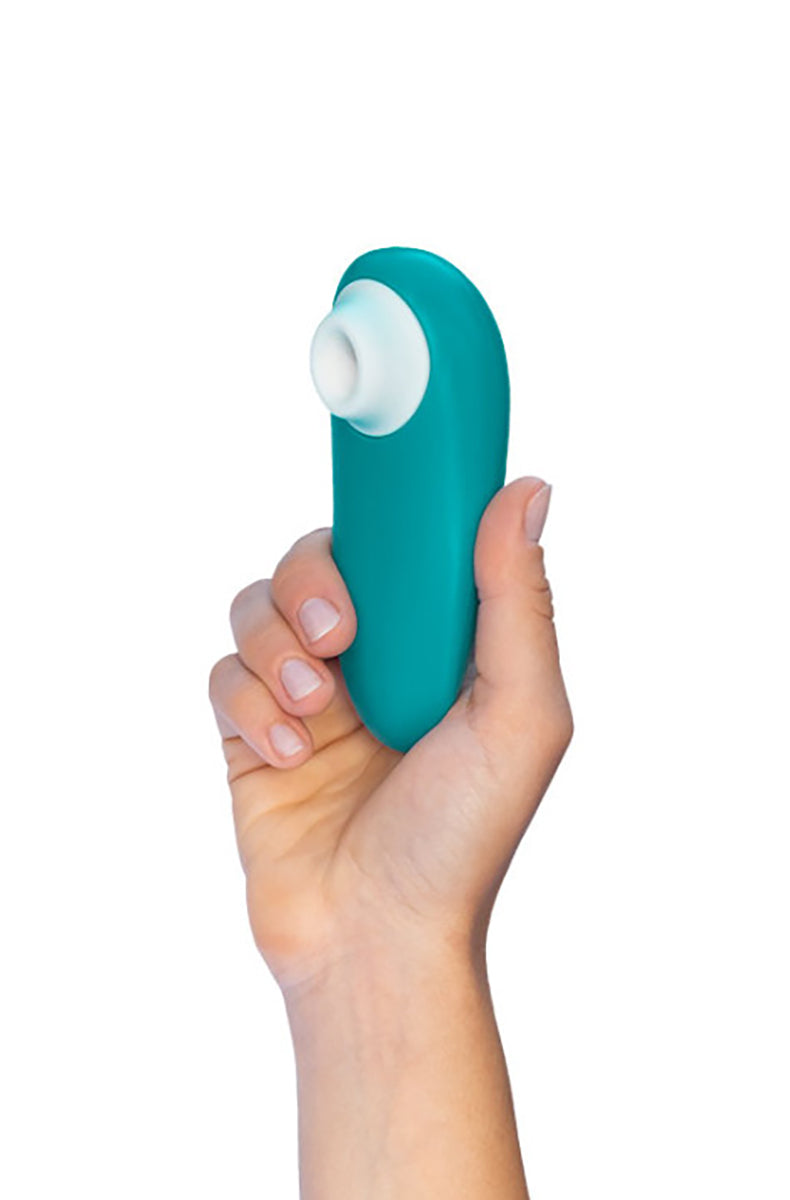 Turquoise Womanizer Starlet 3 third product view showing curved compact body.