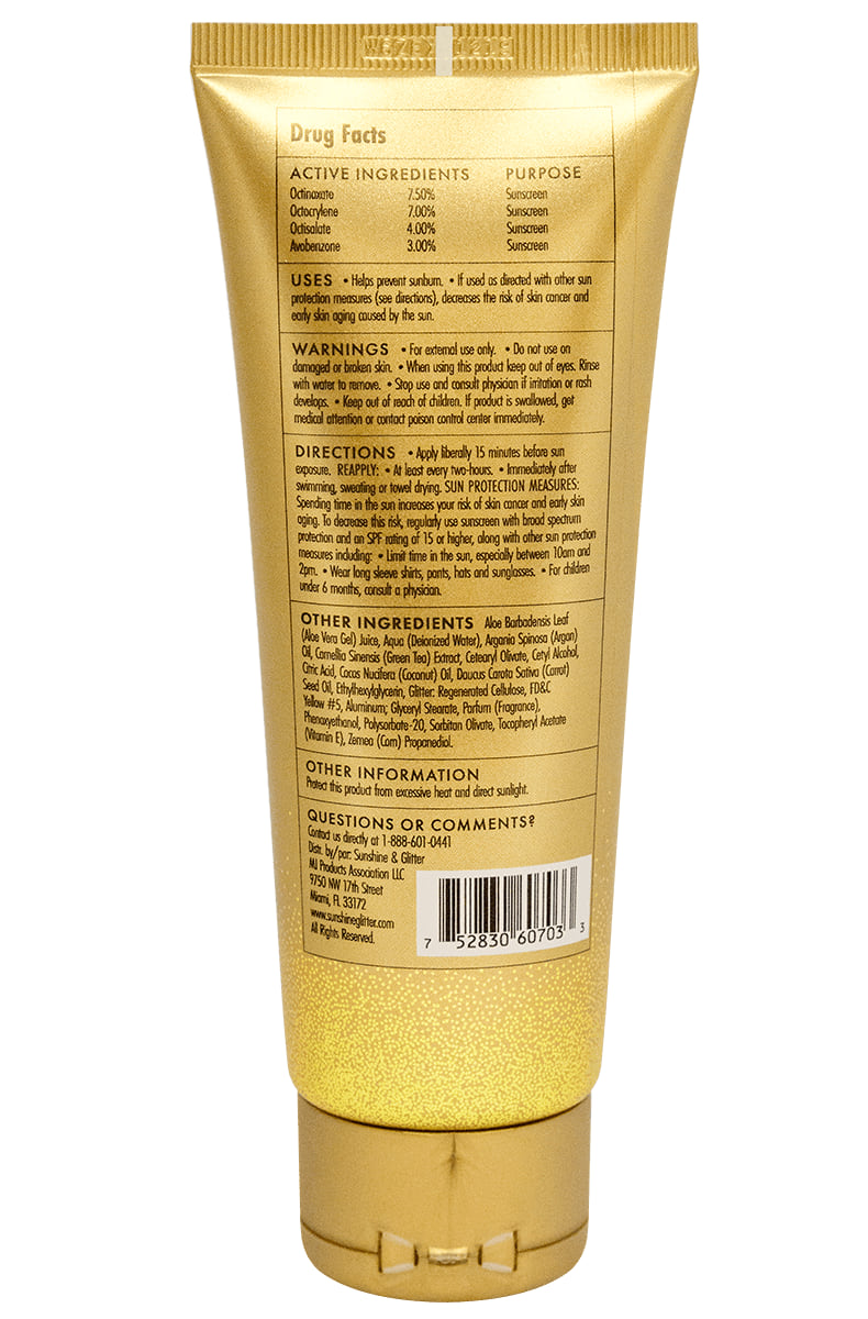 Beach Gypsy SPF 30+ glitter sunscreen bottle label closeup showing UVA UVB protection text and gold-glitter visual.