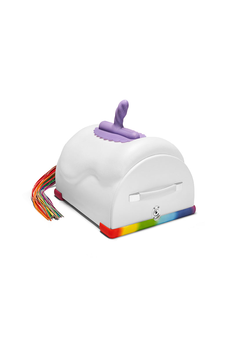 White saddle-shape Cowgirl Unicorn sex machine, purple silicone unicorn attachment on top, rainbow base, rainbow tail.