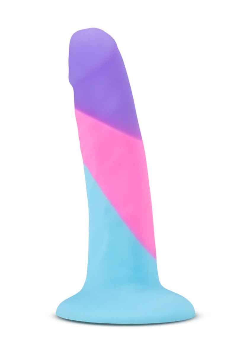 Slim three-color silicone dildo with purple curved tip, pink mid-shaft, light blue base, and flared suction cup.