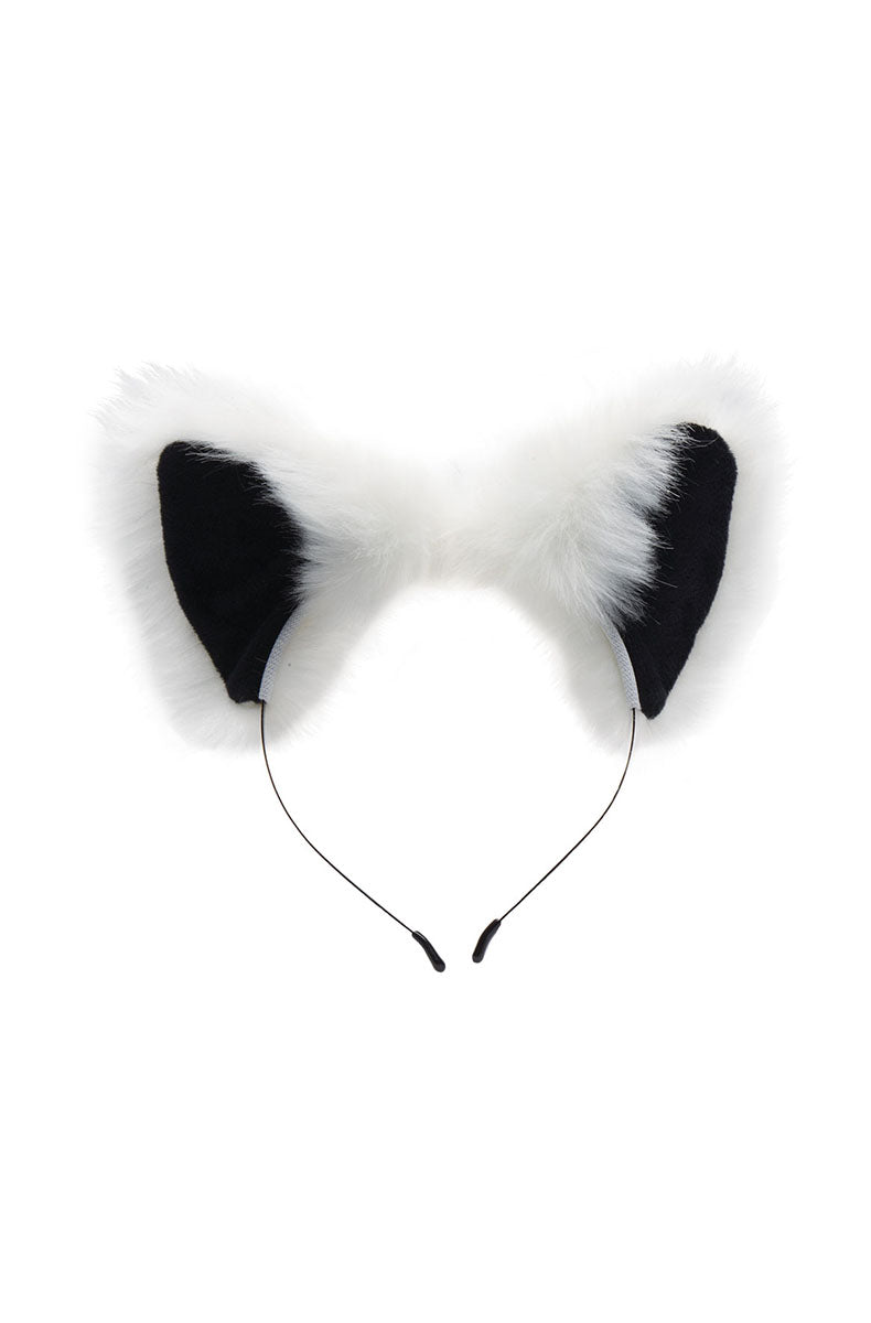 White faux fur fox tail laid flat showing length and fullness, with the black silicone plug on one end.