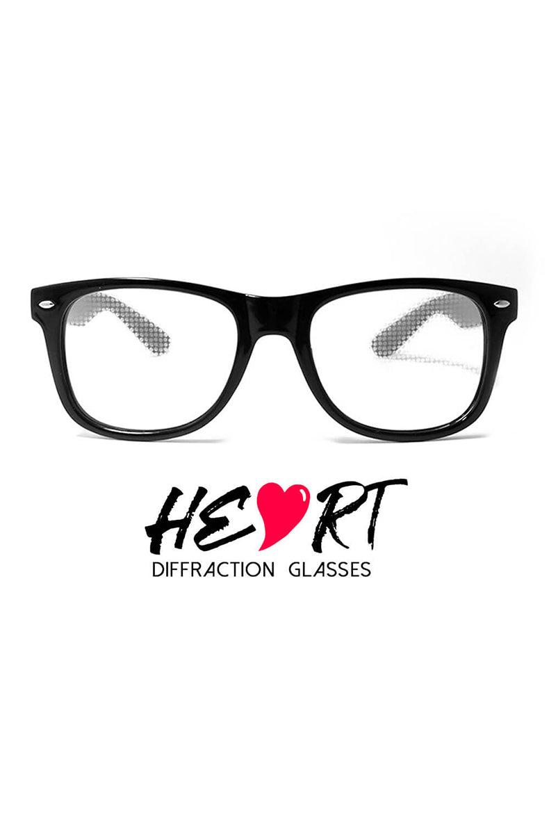 Wayfarer-style sunglasses with glossy black frames and clear diffraction lenses showing a faint heart-pattern etching, with HEART Diffraction Glasses logo printed below the product.