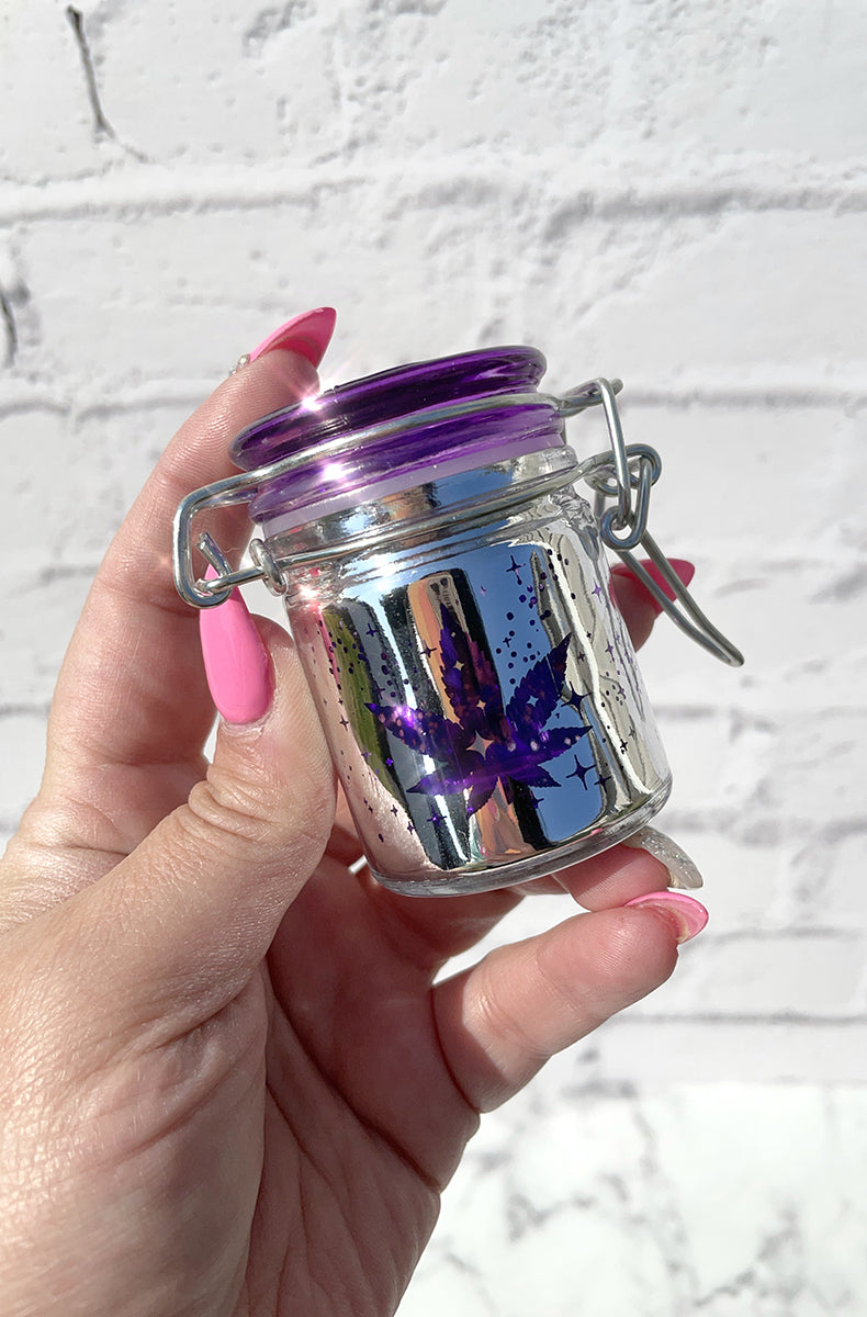 Stoner storage kit: glow-in-the-dark glass spoon pipe, hinged glass storage jar, Blazy Susan rolling kit, smell-proof bag.