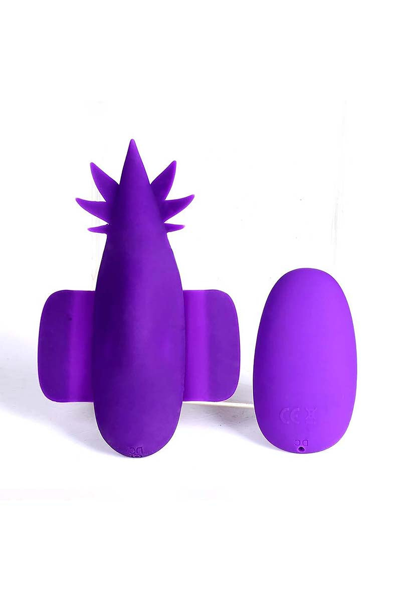 Purple silicone cannabis-leaf shaped Sativa panty vibrator, detail view of remote control.