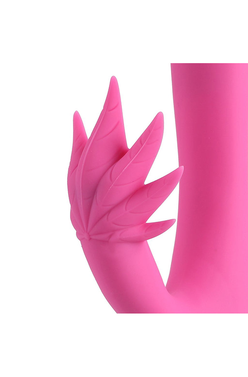 Maui pink 420 rabbit vibrator next to its USB charging cable.