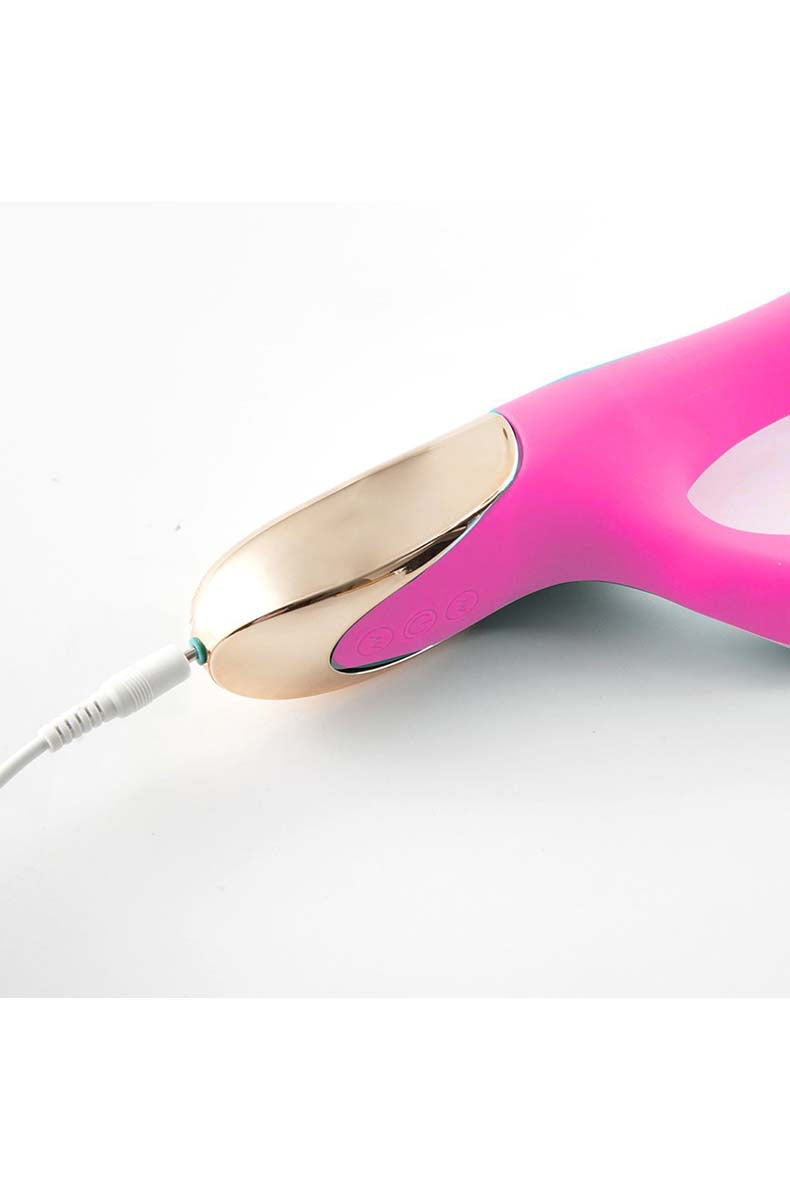 Close-up of the bendable pot-leaf style clitoral stimulator on the Maui pink rabbit vibrator.