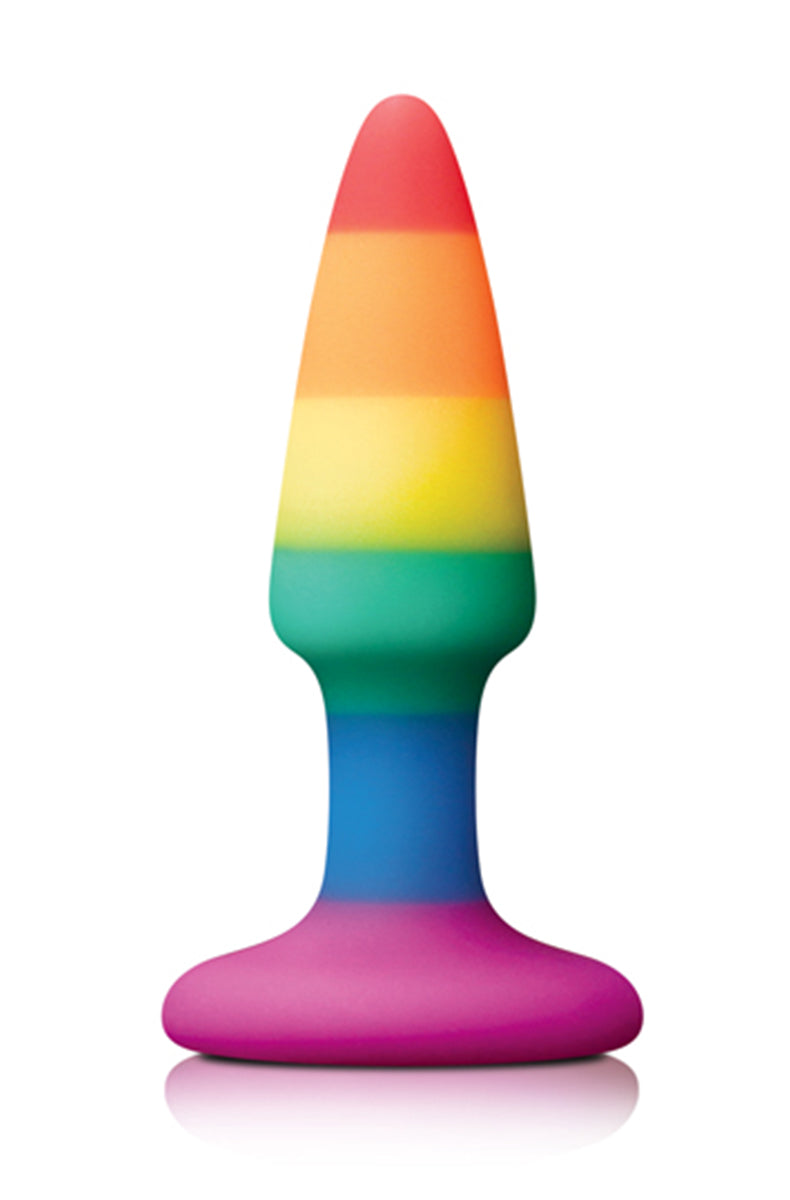 Colours Pride mini silicone anal plug in rainbow stripes with a tapered tip, narrowed neck, and pink suction cup base.