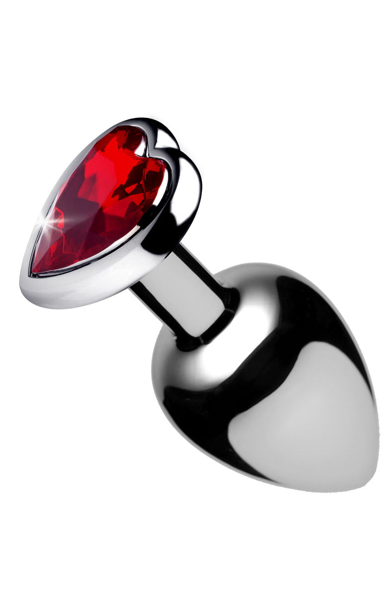 Polished silver aluminum anal plug with a tapered shaft and a flared base set with a faceted red heart gem. Booty Sparks.
