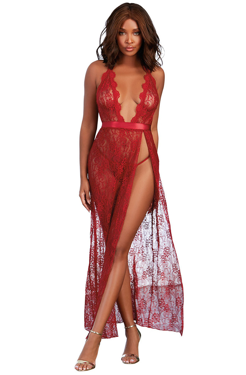 Garnet sheer floral lace maxi dress with thin shoulder straps, deep V plunge with scalloped lace edge, satin sash at the waist, high thigh slit, and floor-length hem.