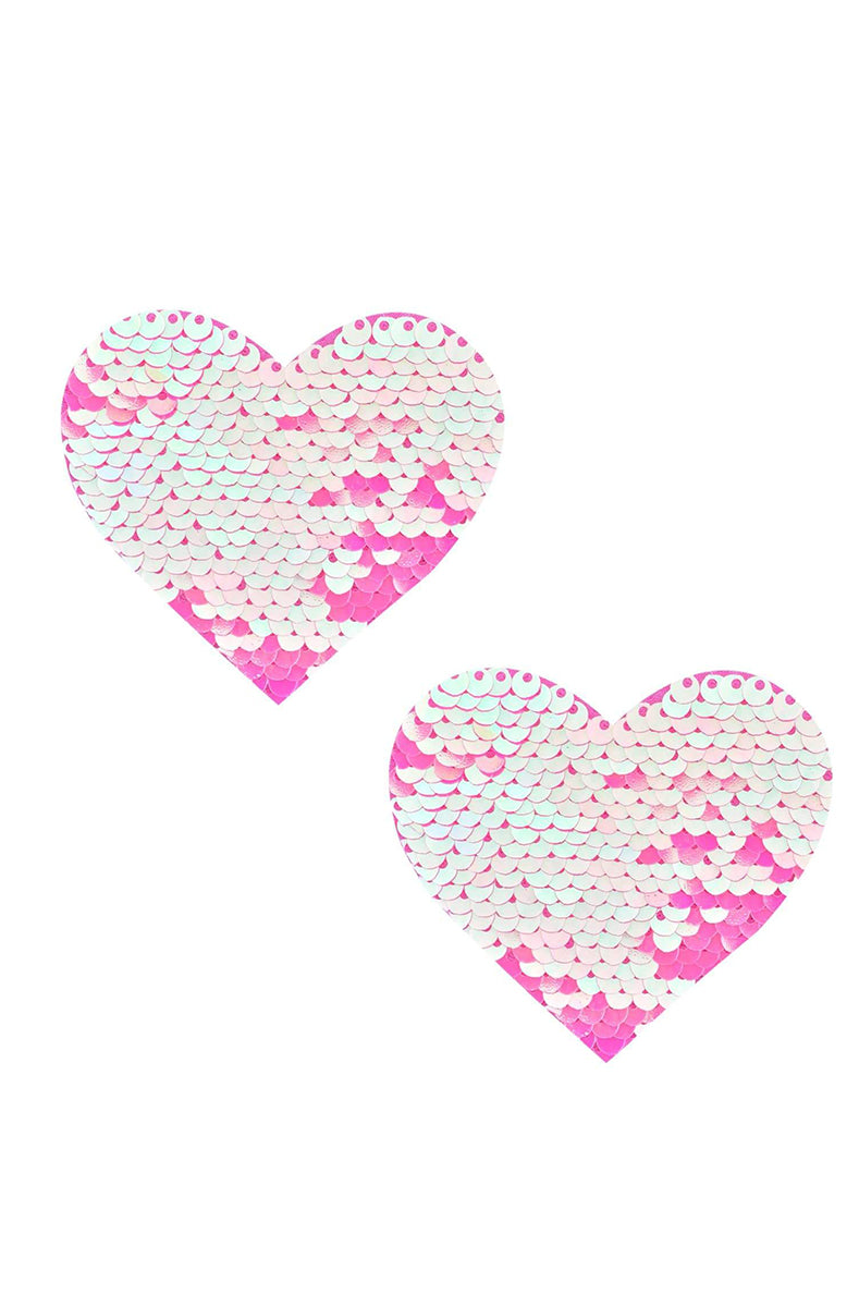 Two heart-shaped pasties covered in flip sequins that read hot pink one direction and iridescent pearl-pink the other.