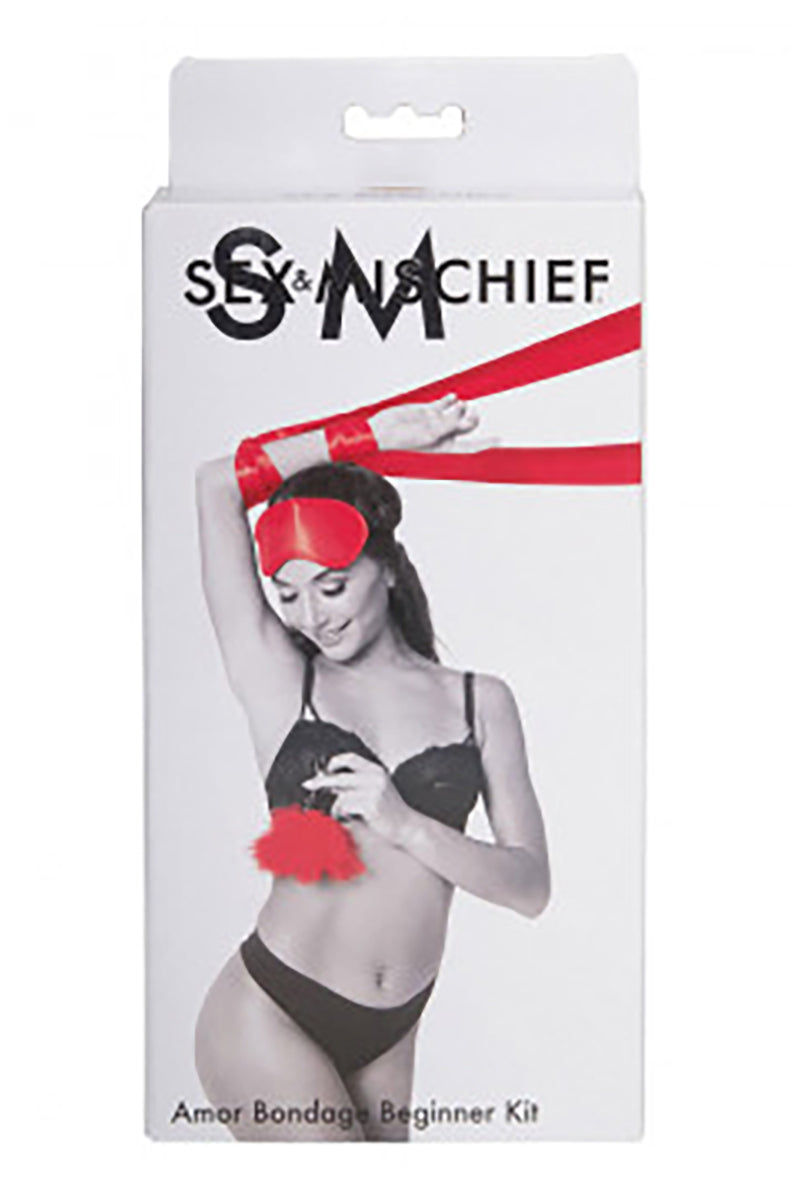 Sex and Mischief Amor Bondage Beginner Kit retail box showing a model with the red satin kit pieces.