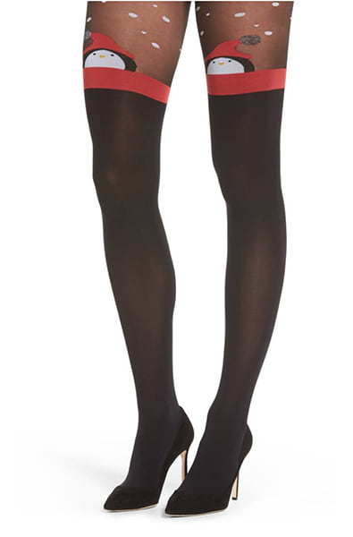 Black tights with a sheer top section ending in a red band with a knit penguin in a red Santa hat at each thigh, opaque legs below.