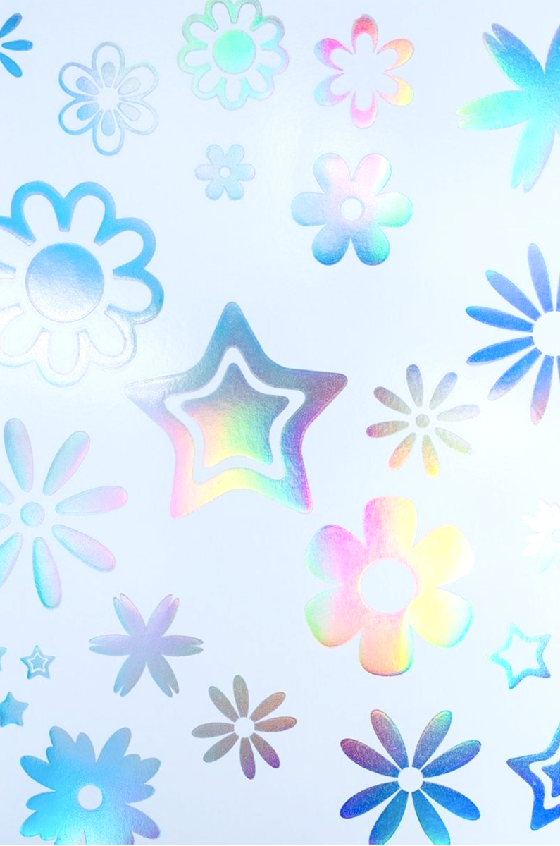Lunautics Temporary Holo Foil Tattoo sheet in Flower Power design, holographic foil flower tattoos on backing paper.