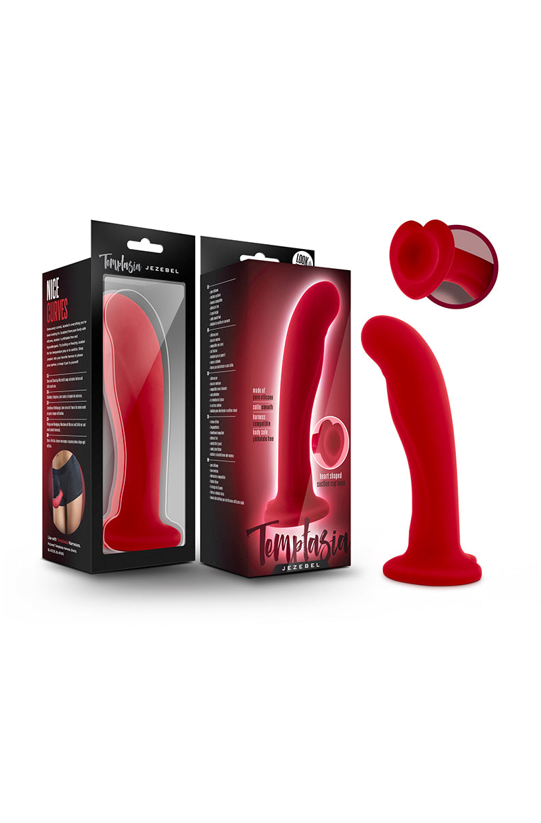 Detail of red silicone dildo head and upper shaft showing smooth satin texture.