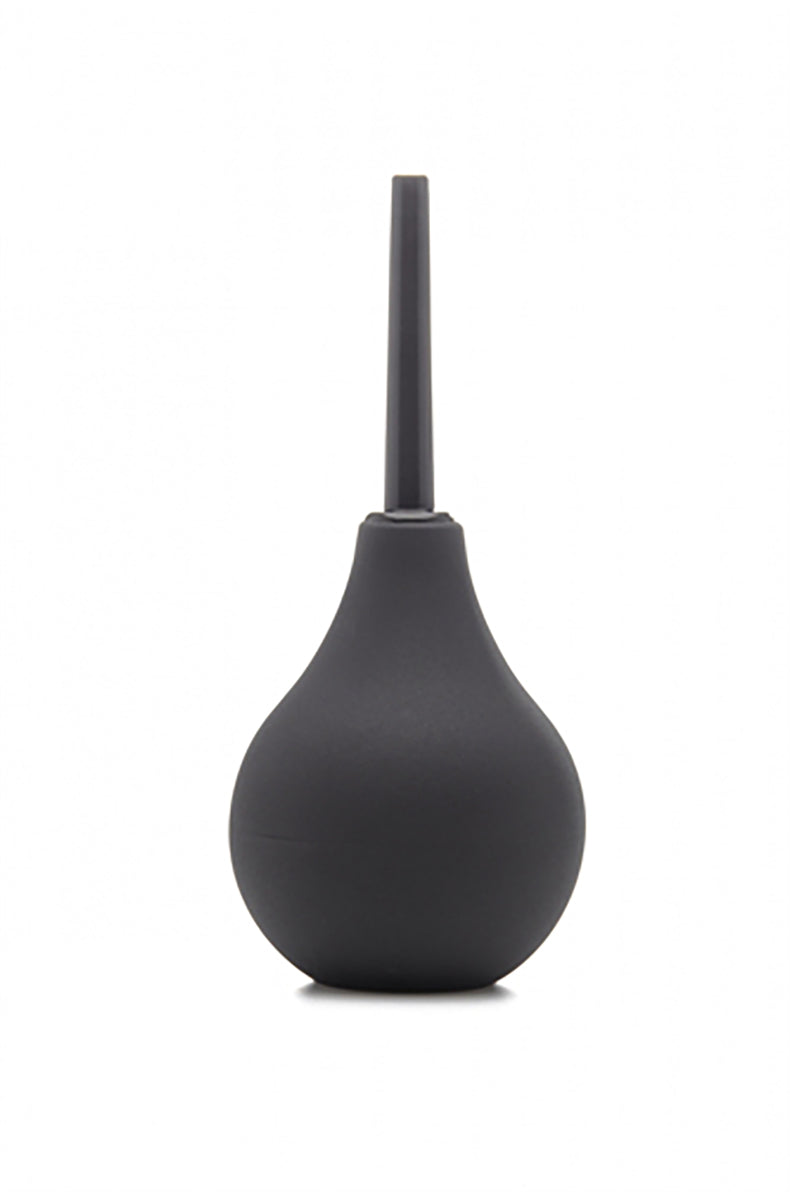 Glossy black small anal douche bulb with smooth straight nozzle on white background.