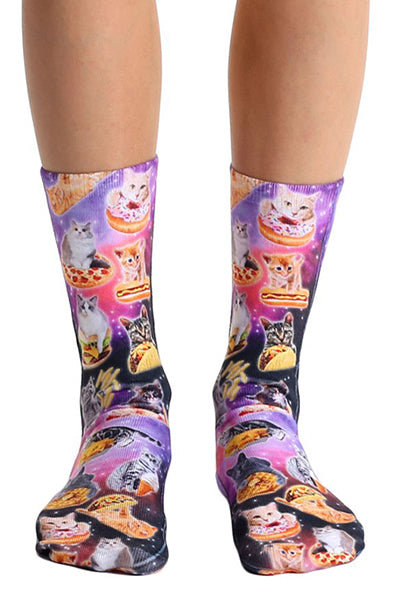 Crew socks with photo-print cats perched on pizza slices, tacos, and donuts across a purple and pink galaxy background.