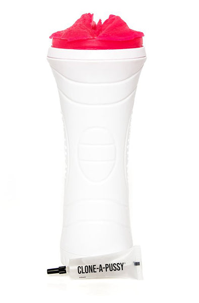 Clone-A-Pussy Plus kit contents showing molding powder, silicone parts, and white stroker canister.