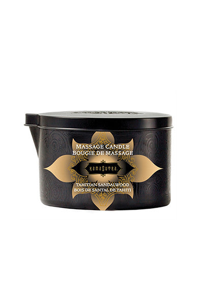 Kama Sutra Massage Oil Candle in Tahitian Sandalwood with a brown label on a white background.