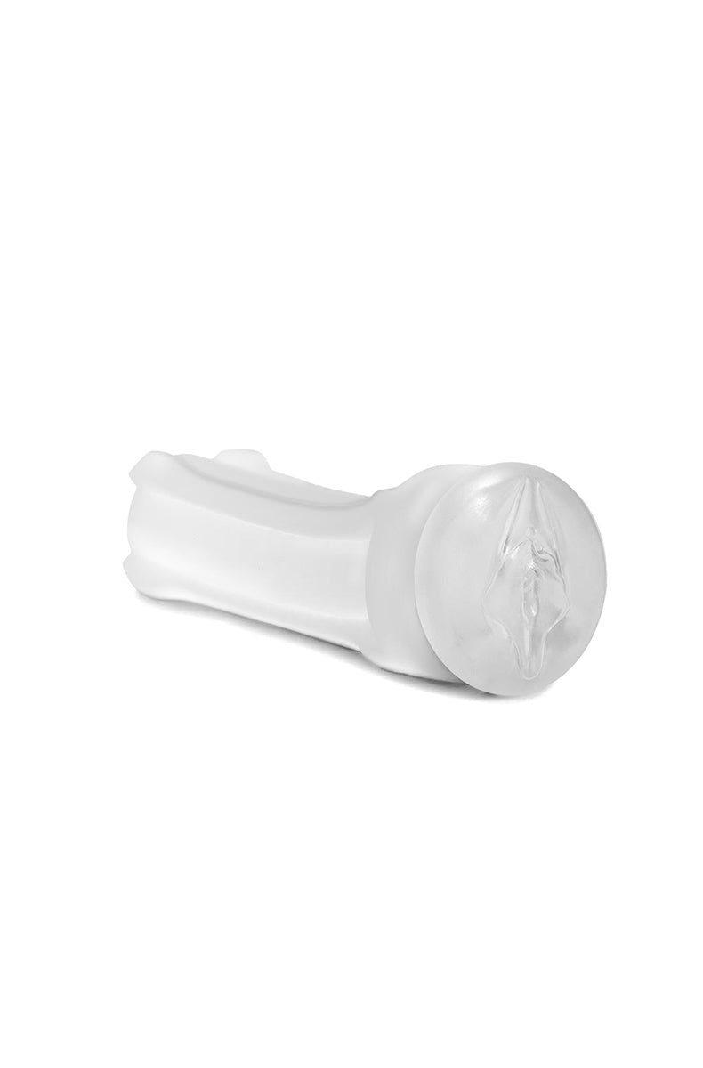View of the clear TPE pussy stroker sleeve removed from the case showing the textured opening.