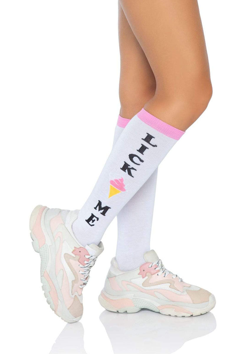White knee-high socks with a pink cuff, a knit pink ice-cream cone graphic at the calf, and LICK ME knit vertically in black.