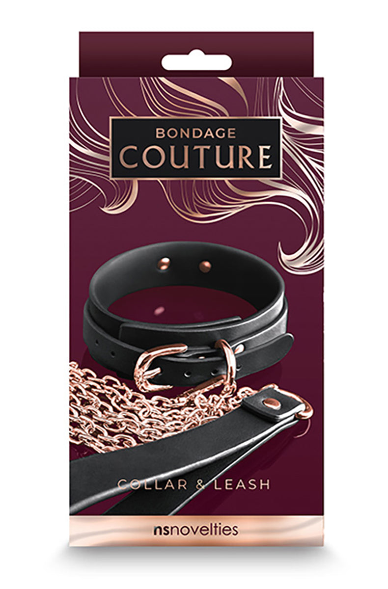 Bondage Couture retail box showing the narrow black collar with rose-gold buckle and the rose-gold chain leash inside.