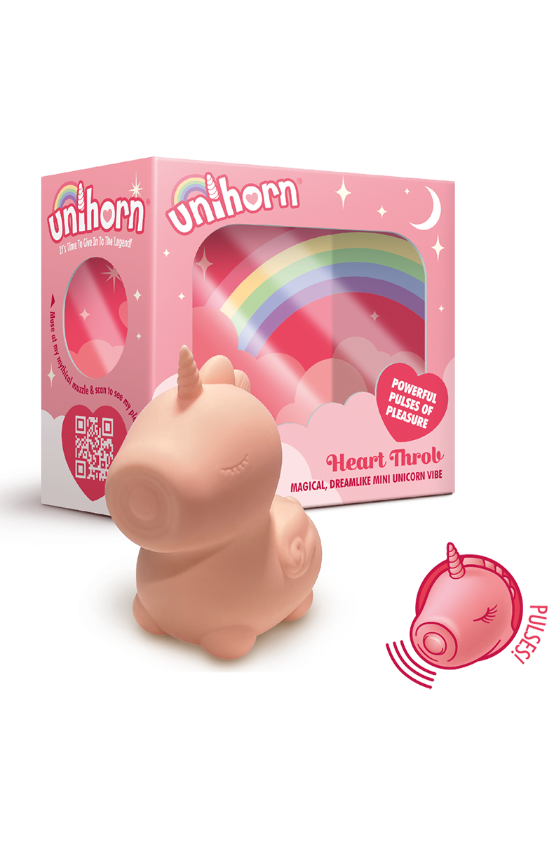 Pink silicone Unihorn Heart Throb unicorn vibrator with a small horn and closed eyes, next to its pink rainbow gift box.