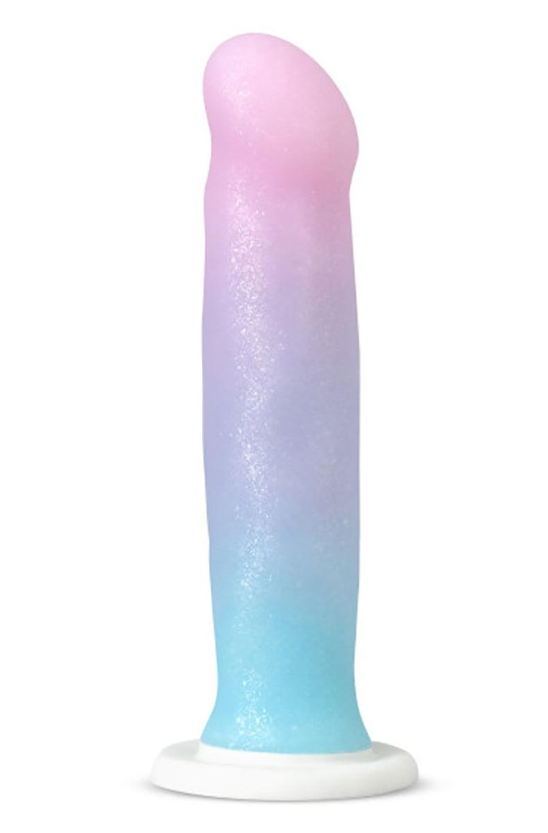 Iridescent glitter silicone dildo with a pink head fading to a turquoise-blue suction-cup base.