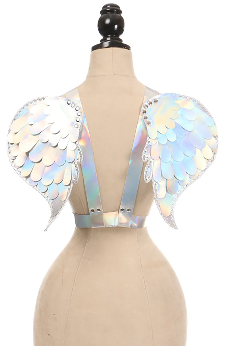 Silver-iridescent holographic vinyl angel wings with layered overlapping feathers and silver studs, mounted on a strap harness.